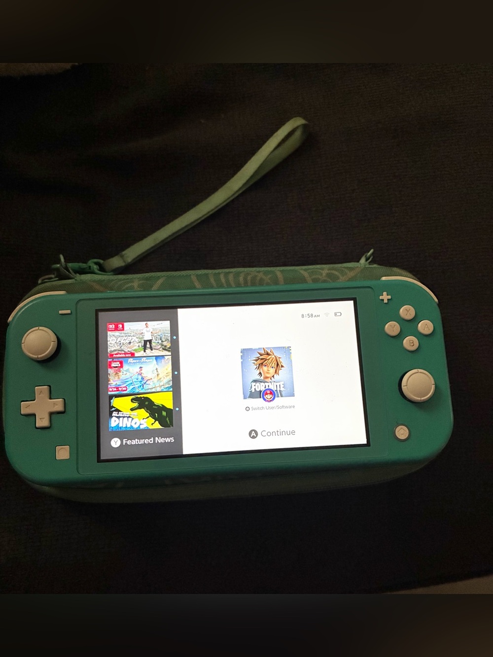 Nintendo Switch Lite - Turquoise Green Handheld Console with Case